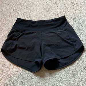 speed up mid rise lined shorts 4” in size 2